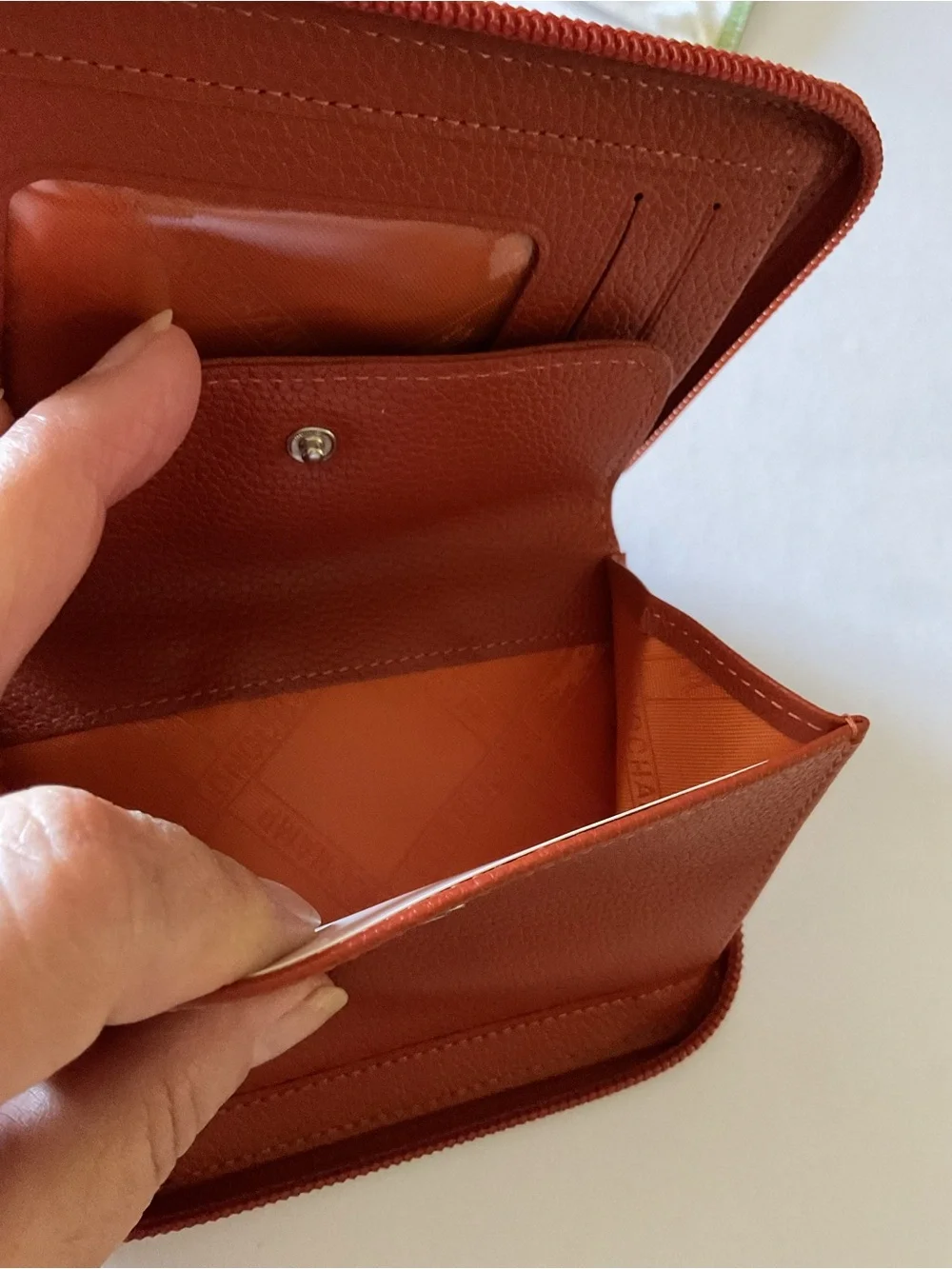 LONGCHAMP PEBBLED LEATHER BIFOLD ZIP AROUND WALLET WITH ID WINDOW AMBER NWOT